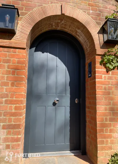 red armored home door